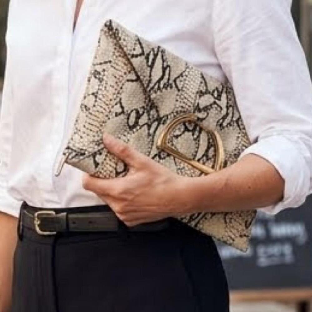 Snake print clutch with gold